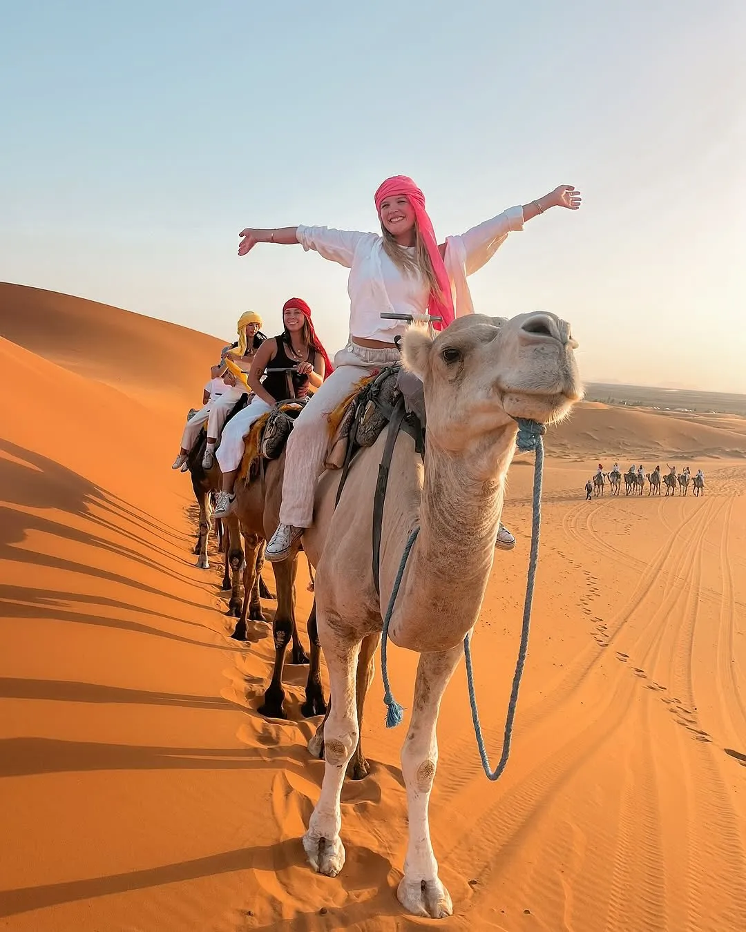 Ride the dunes on a camel in Merzouga, during our Morocco Desert Tours